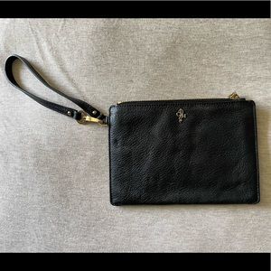 Cole Haan black wristlet with gold logo and trim, detachable strap loop